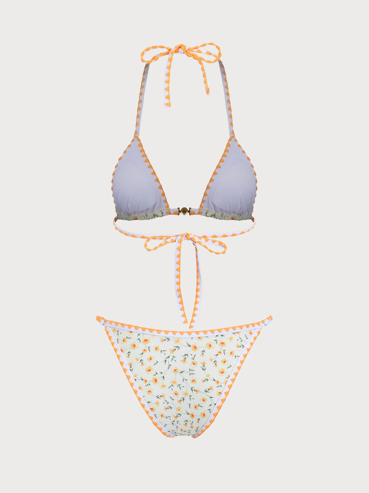 Gelbes Bikini-Set mit Blumenmuster und kontrastierenden Zähnen